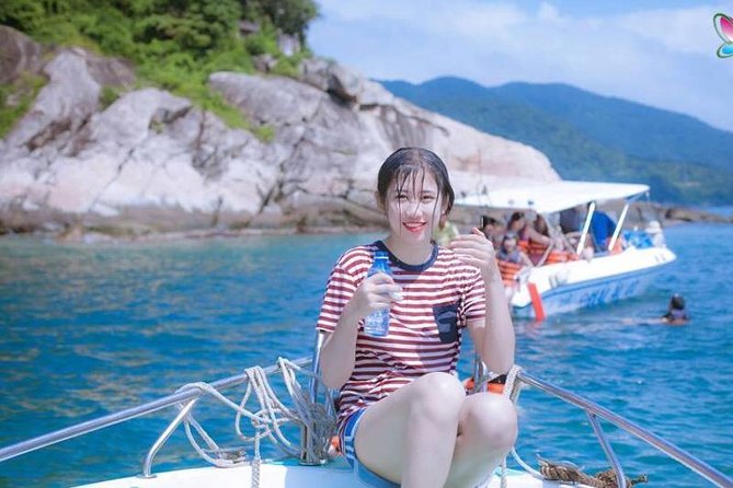 Cham Island: Snorkeling Tour - Traditional wooden boat transfer: part ride, part decompression