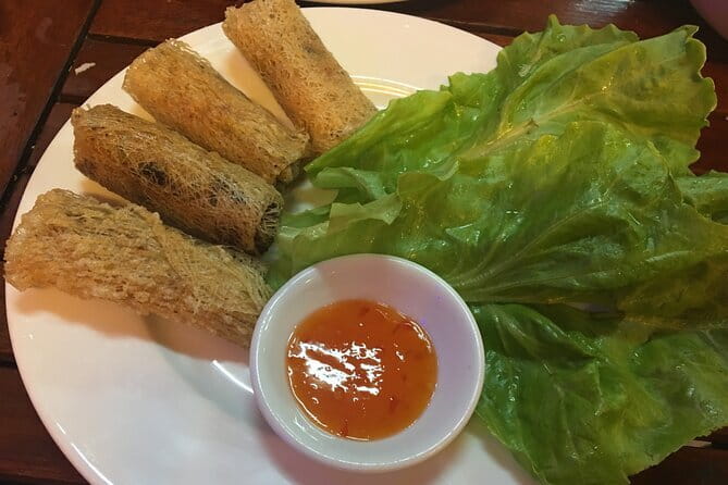Cooking Class with Tra Que Eco Farm & Local Market Discovery - Inside the Cooking House: Hands-On Lessons for Four Vietnamese Dishes