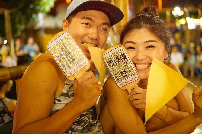 Evening Walking Food Tour, folk game and lantern boat - Hoi An Ancient Town games: bingo and the pot-breaking folk play