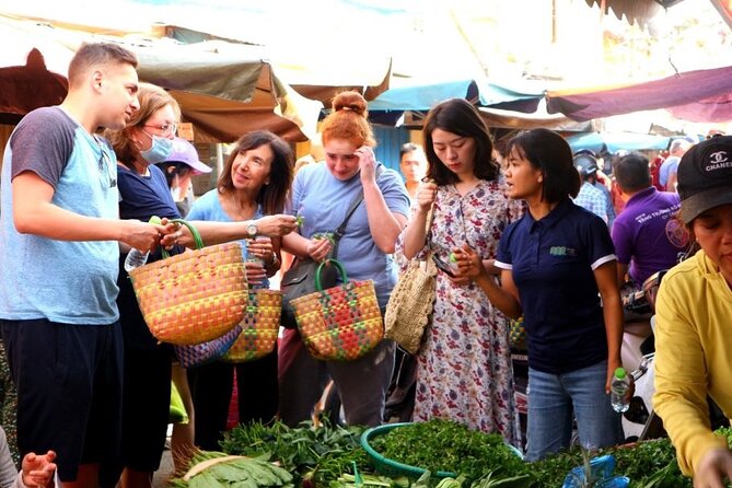 Experience Local Market and Boat Ride with Cooking Class - Cam Thanh bamboo basket boat: the silly part is the point