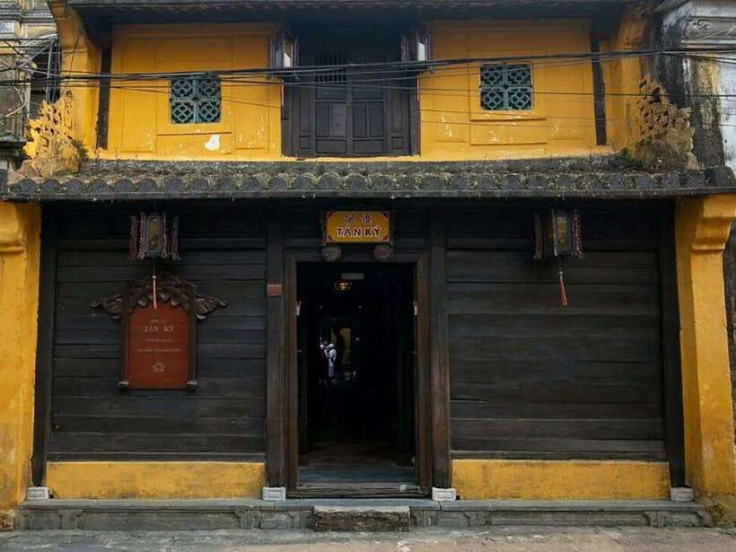 From Da Nang: Hoi An City Tour W Boat Ride - Lantern Release - Japanese Bridge: the carvings that connect communities