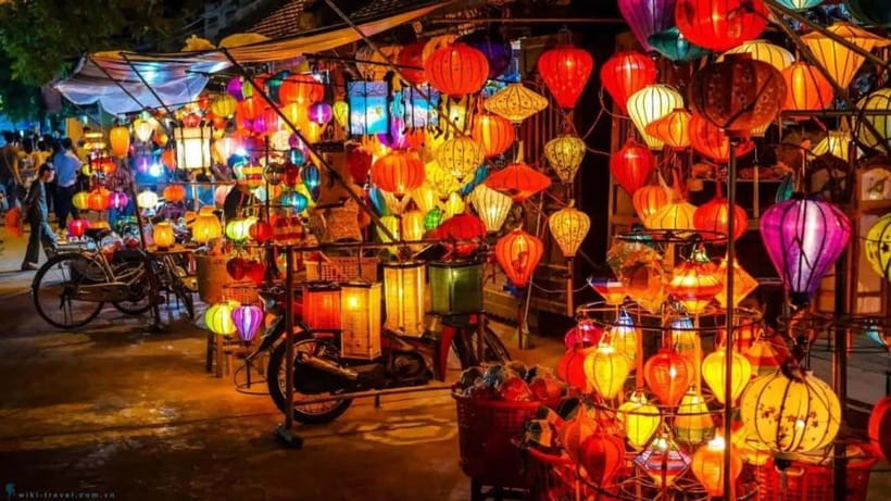 From Hoi An/Da Nang: Hoi An City Tour & Lanterns Release - Stop 1: Hoi An Market and the tailor-shop vibe