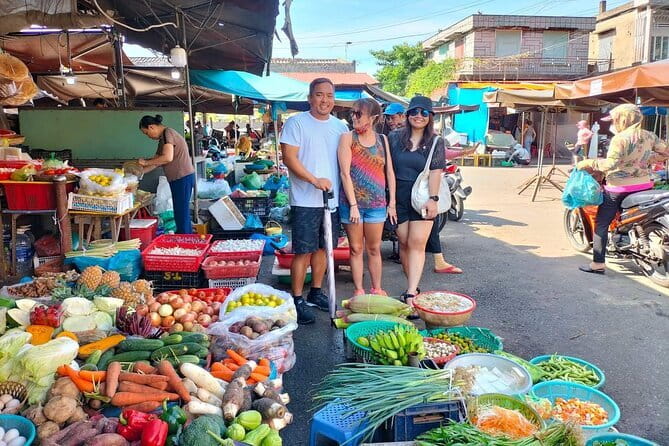 Hoi An Cooking Class & Vespa Cooking Adventure Tour - Tra Que Vegetable Village and Hand-Picking Herbs