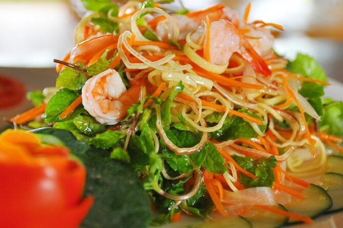 Hoi An Cooking Class With Market Tour and Bamboo Basket Boat Ride - Bay Mau Coconut Village and the round bamboo boat ride