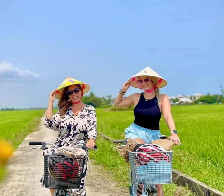 Hoi An: Countryside Biking Sighseeing & Basket Boat Ride - Biking Past Rice Fields, Shrimp Farms, and Animals
