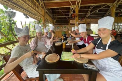 “Hoi An Countryside Cycling Tour–Farming Experience–Cooking Class - Bay Mau Coconut Forest: buffalo feeding and a basket-boat moment