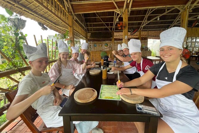 “Hoi An Countryside Cycling Tour–Farming Experience–Cooking Class - Bay Mau Coconut Forest: buffalo feeding and a basket-boat moment