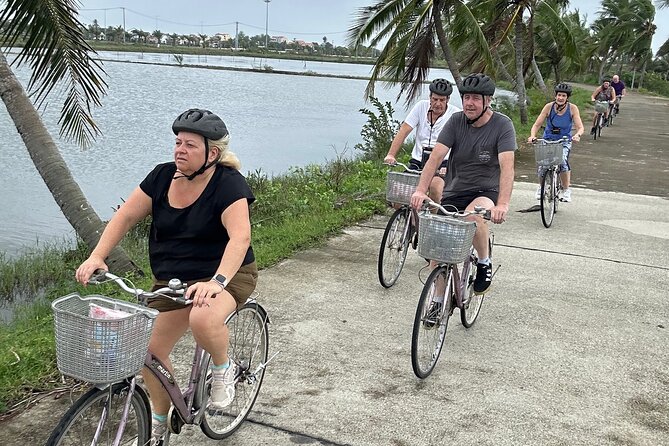Hoi An countryside cycling Tour,Basket Boat-organic farming-lunch - Bay Mau Coconut Forest: Coconuts, Fishing-Style Fun, and Fresh Water