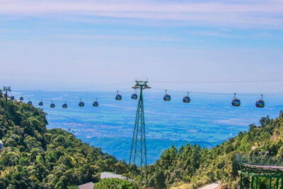 Hoi An/Da Nang: Golden Bridge and Ba Na Hill Tour - Entering Ba Na Hills by cable car: the climb that sets expectations