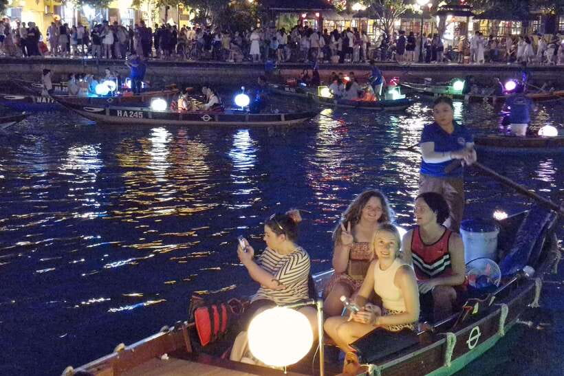 Hoi An : Lantern Boat Trip & Release Lantern - The night boat pier pause: a calmer moment mid-ride