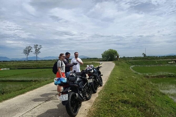 Hoi An to Hai Van pass loop with Motorbike Tour Mr Phu - My Khe Beach: a scenic coast ride with a short, sweet stop