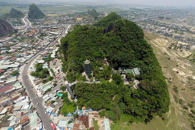 Hoi An to Hue by Private Car via Many Scenic Stopovers - Marble Mountains, Heaven Gate, and Cave Pagodas: The First Big Stop