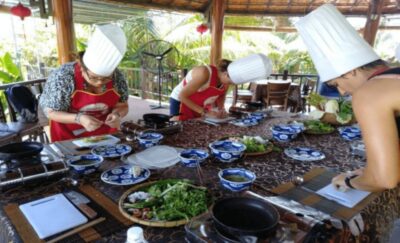Hoi An: Traditional Cooking Class & meal with Local Family - Arrival, welcome tea, and the countryside kitchen setup