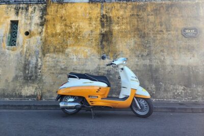 Hoi An Vespa Tours: Hoi An Highlights and Hidden Gems - Stop 1: Hoi An Ancient Town by scooter lanes and quick culture breaks