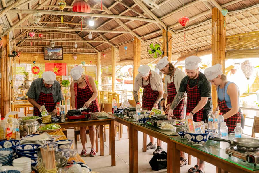 Market Tour - Cooking Class - Coconut Boat Riding - Fishing nets, folk songs, and coconut-leaf souvenirs