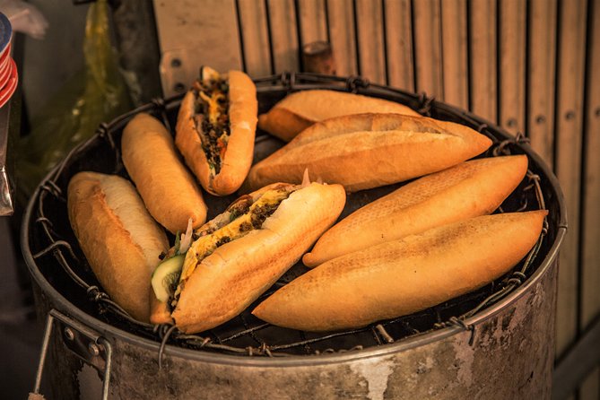 Private Hoi An Evening Food Tastings Tour by Bike - Evening in Hoi An: Riverfront Dining With Historic-Quarter Views